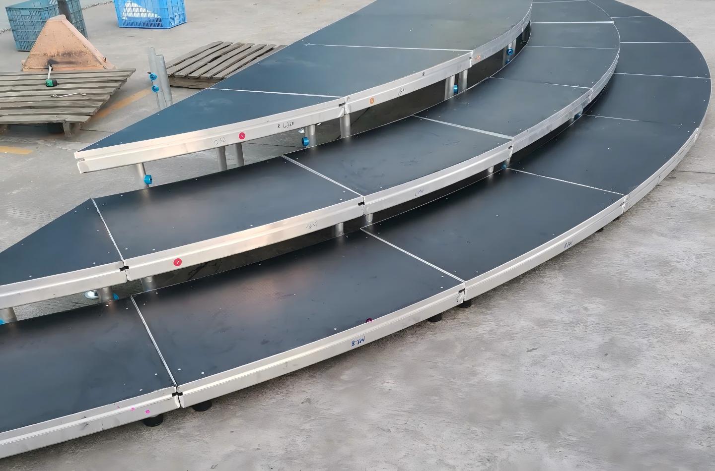 original concept used large-radius curved front edges for the tiered performance platforms.jpg